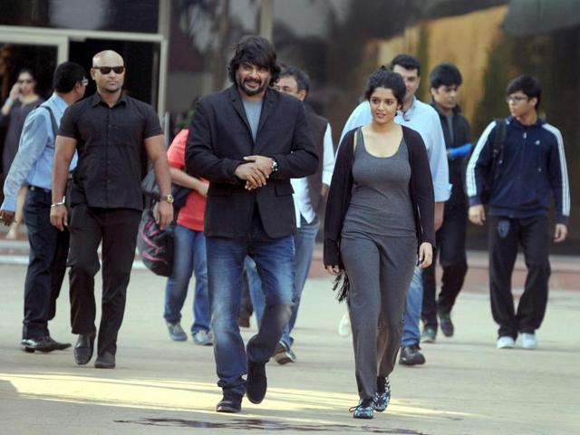 Ritika Singh and R Madhavan walk during the promotion of Saala Khadoos directed by Sudha Kongara in Mumbai on January 11, 2016. (AFP) Ritika Singh and R Madhavan walk during the promotion of Saala Khadoos directed by Sudha Kongara in Mumbai on January 11, 2016. (AFP)