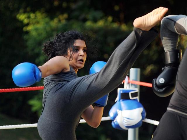 Ritika Singh kicks during a ‘boxing promotion’ of Saala Khadoos in Mumbai . (AFP) Ritika Singh kicks during a ‘boxing promotion’ of Saala Khadoos in Mumbai . (AFP)