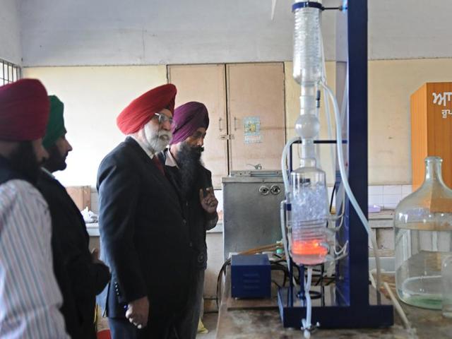 Dr HS Thind, former head, Department of Soil, PAU Ludhiana, inspecting the Distillation Unit in Ropar on Tuesday. (Gurminder Singh/HT Photo) Dr HS Thind, former head, Department of Soil, PAU Ludhiana, inspecting the Distillation Unit in Ropar on Tuesday. (Gurminder Singh/HT Photo)