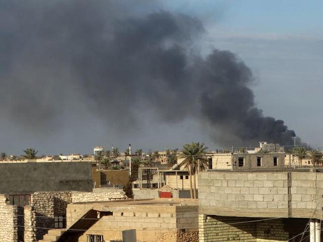 In this Monday, Jan. 4, 2016 photo, smoke rises from Islamic State positions following a U.S.-led coalition airstrike in Ramadi, 70 miles (115 kilometers) west of Baghdad, Iraq. Islamic State had captured Ramadi in May, in one of its biggest advances since the U.S.-led coalition began striking the group in 2014. Recapturing the city, which is the provincial capital of Anbar, provided a major morale boost for Iraqi forces. (AP Photo) (AP) In this Monday, Jan. 4, 2016 photo, smoke rises from Islamic State positions following a U.S.-led coalition airstrike in Ramadi, 70 miles (115 kilometers) west of Baghdad, Iraq. Islamic State had captured Ramadi in May, in one of its biggest advances since the U.S.-led coalition began striking the group in 2014. Recapturing the city, which is the provincial capital of Anbar, provided a major morale boost for Iraqi forces. (AP Photo) (AP)