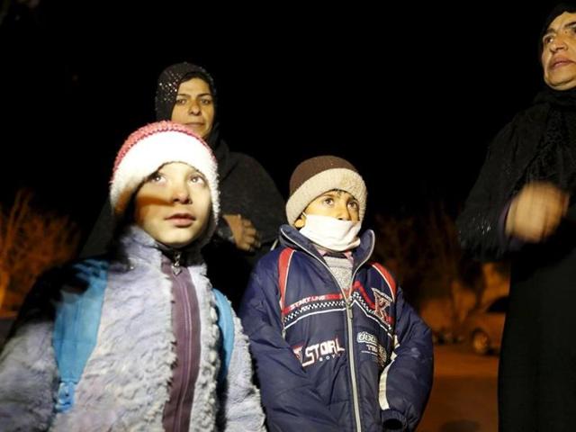 Residents who say they have received permission from the Syrian government to leave the besieged town, depart after an aid convoy entered Madaya. (REUTERS) Residents who say they have received permission from the Syrian government to leave the besieged town, depart after an aid convoy entered Madaya. (REUTERS)