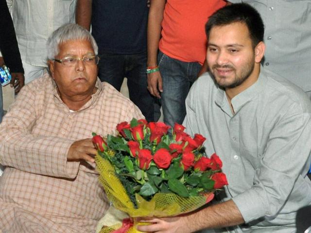 Deputy Chief Minister of Bihar Tejaswi Yadav being greeted by IAS Deepak Prasad after he took charge as Bihar's PWD Minister in Patna. (PTI Photo) Deputy Chief Minister of Bihar Tejaswi Yadav being greeted by IAS Deepak Prasad after he took charge as Bihar's PWD Minister in Patna. (PTI Photo)
