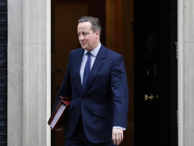 Britain's Prime Minister David Cameron leaves No 10 Downing Street to attend PMQs at the parliament in London, Wednesday. (AP) Britain's Prime Minister David Cameron leaves No 10 Downing Street to attend PMQs at the parliament in London, Wednesday. (AP)