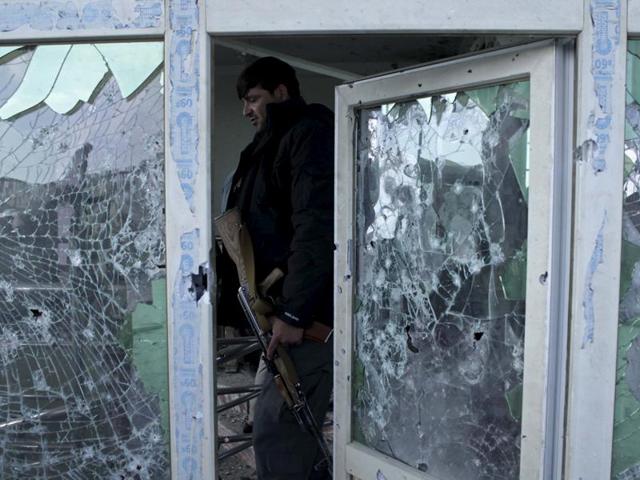 Afghan security force personnel inspect a building used by insurgents to launch an attack on the Indian consulate, in Mazar-i-Sharif on January 5. (AFP Photo) Afghan security force personnel inspect a building used by insurgents to launch an attack on the Indian consulate, in Mazar-i-Sharif on January 5. (AFP Photo)