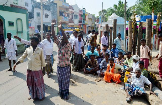 People express their disappointments at Avaniyapuram in Madurai as Jallikattu preparations were stopped after Supreme Court order banning Jallikattu on Tuesday. (PTI) People express their disappointments at Avaniyapuram in Madurai as Jallikattu preparations were stopped after Supreme Court order banning Jallikattu on Tuesday. (PTI)