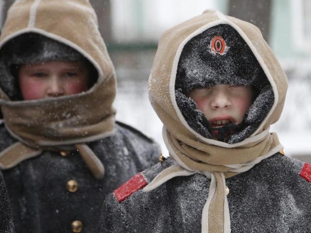 Pupils of Navy cadet classes walk in snow in St.Petersburg, Russia. Notice how their cheeks have turned red. (AP)