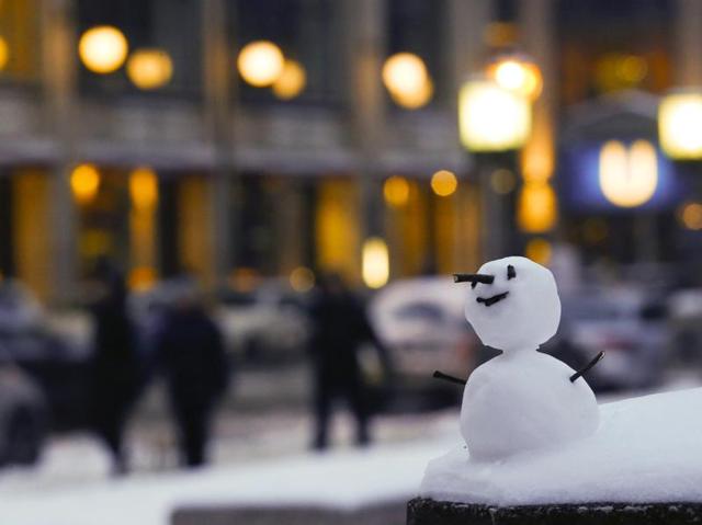 A little snowman stands at the Gendarmenmarkt square after snow falls in Berlin, Germany. (REUTERS)