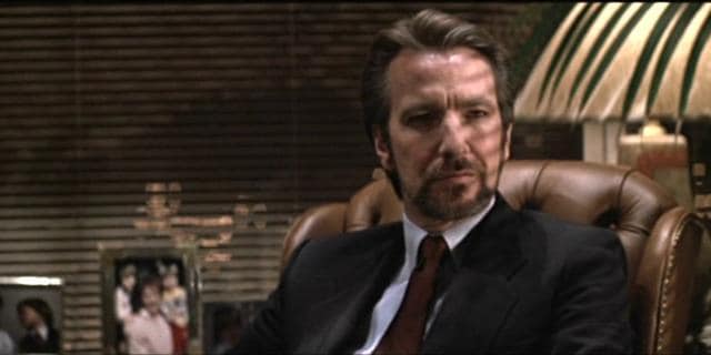 Rickman as Hans Gruber in Die Hard (1988).