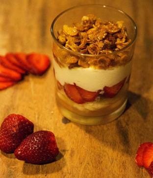 The dessert was made of yogurt, berries, banana, home made granola and honey. The dessert was made of yogurt, berries, banana, home made granola and honey.