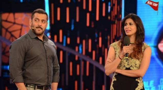 Salman Khan on the Bigg Boss stage with Kishwar Merchant who quit the show after she was offered Rs 15 lakh during a task. (COLORS)