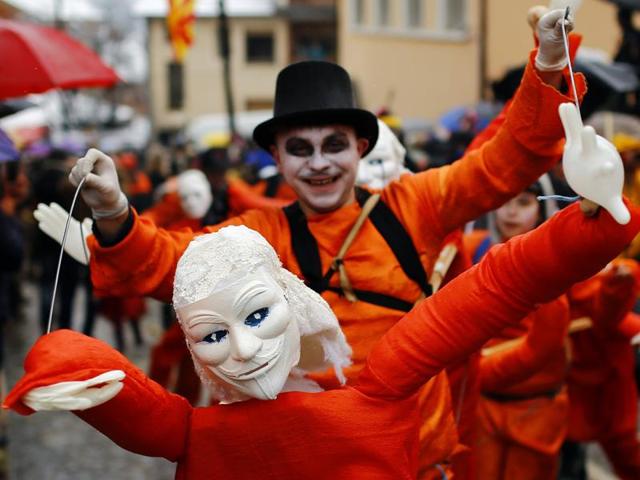 The highlights include a political satire where masked villagers act out current events. It is one of the most famous village festivals in the Balkans. Revellers participate in a parade on the street during Vevcani carnival. (REUTERS)