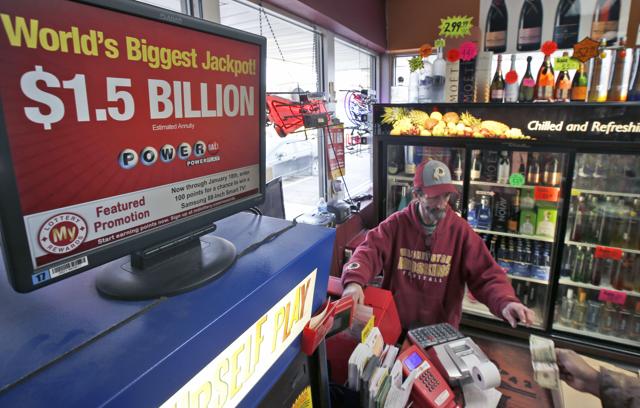 Steve Poulin sells Powerball tickets at the Sunnybrook Tavern and Liquor Store. (AP) Steve Poulin sells Powerball tickets at the Sunnybrook Tavern and Liquor Store. (AP)