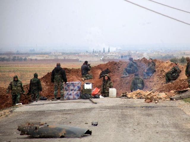Syrian government forces hold a position in the village of Ain al-Beida in the countryside of Al-Bab in the eastern part of Syrian northern Aleppo province after taking control of the area from Islamist jihadists on January 13, 2016. (AFP) Syrian government forces hold a position in the village of Ain al-Beida in the countryside of Al-Bab in the eastern part of Syrian northern Aleppo province after taking control of the area from Islamist jihadists on January 13, 2016. (AFP)