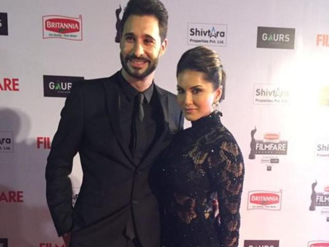Lady in black: Sunny Leone with her husband Daniel Weber. (Twitter/Filmfare) 