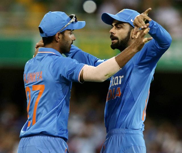 India's Ajinkya Rahane, left, and Virat Kohli, right, celebrate the wicket of Australia's Aaron Finch during the 2nd One Day International cricket match between Australia and India in Brisbane. (AP Photo) India's Ajinkya Rahane, left, and Virat Kohli, right, celebrate the wicket of Australia's Aaron Finch during the 2nd One Day International cricket match between Australia and India in Brisbane. (AP Photo)