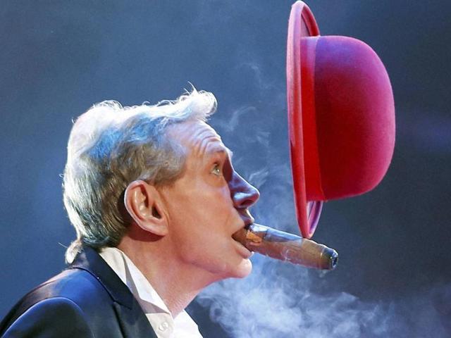 Juggler Kris Kremo performs during the opening of the 40th Monte-Carlo International Circus Festival in Monaco, Thursday, January 14, 2016. Organised and presided by HSH Princess Stéphanie of Monaco, a selection of the best international acts is presented each year which is broadcasted around the globe. (AP)