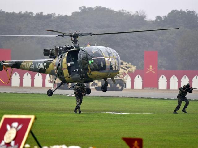 An army chopper drops soldiers to the site of a mock combat demonstration. (vipin kumar/ht photo) An army chopper drops soldiers to the site of a mock combat demonstration. (vipin kumar/ht photo)