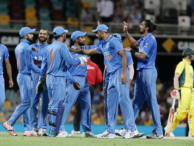 India celebrates getting the wicket of Australia's Shaun Marsh during the 2nd One Day International cricket match between Australia and India. (AP Photo) 