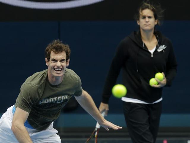 Britain's Andy Murray serves as his coach Amelie Mauresmo watches. (AP Photo) Britain's Andy Murray serves as his coach Amelie Mauresmo watches. (AP Photo)