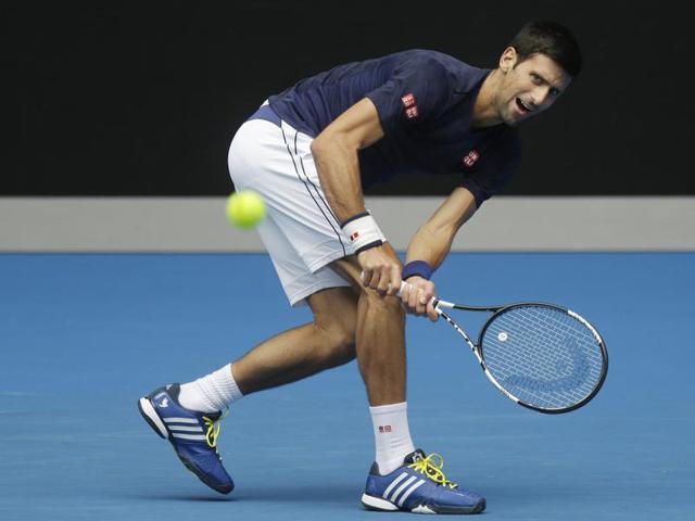 Serbia's Novak Djokovic makes a backhand return during a practice session ahead of the start of the Australian Open in Melbourne on January 15, 2016. The Australian Open begins on January 18. (AP Photo) Serbia's Novak Djokovic makes a backhand return during a practice session ahead of the start of the Australian Open in Melbourne on January 15, 2016. The Australian Open begins on January 18. (AP Photo)