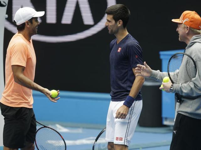 Spain's Fernando Verdasco, left, jokes with Djokovic and Boris Becker, right, during a practice session ahead of the start of the Australian Open. (AP Photo) Spain's Fernando Verdasco, left, jokes with Djokovic and Boris Becker, right, during a practice session ahead of the start of the Australian Open. (AP Photo)