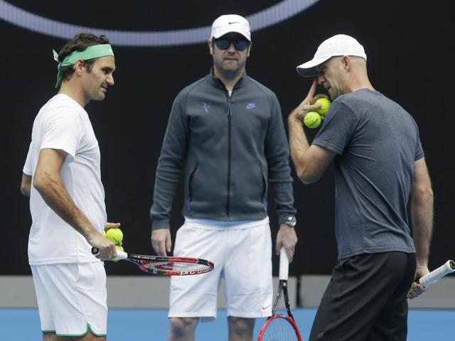 Switzerland's Roger Federer, left, talks with his coaches Ivan Ljubicic right, and Severin Luthi during a practice session ahead of the start of the Australian Open. (AP Photo) Switzerland's Roger Federer, left, talks with his coaches Ivan Ljubicic right, and Severin Luthi during a practice session ahead of the start of the Australian Open. (AP Photo)