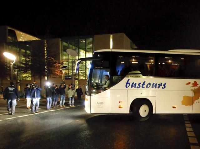 A bus with refugees from the Bavarian town of Landshut leaves the Chancellery building in Berlin, Germany. An irate local politician in Germany's southern state of Bavaria dispatched a bus filled with dozens of refugees to Chancellor Angela Merkel's office in Berlin as a protest against her open-door refugee policy. (Reuters Photo) A bus with refugees from the Bavarian town of Landshut leaves the Chancellery building in Berlin, Germany. An irate local politician in Germany's southern state of Bavaria dispatched a bus filled with dozens of refugees to Chancellor Angela Merkel's office in Berlin as a protest against her open-door refugee policy. (Reuters Photo)