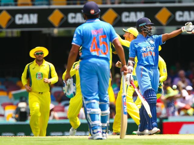 India's Shikhar Dhawan (R) reacts after being dismissed during the match. (AFP Photo) 