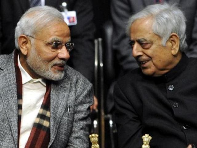 File photo of PM Modi and CM Mufti Mohammad Sayeed during oath ceremony in Jammu.(HT Photo)