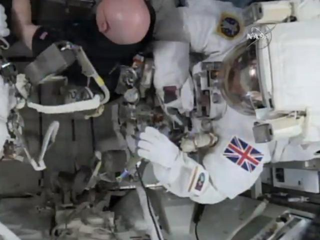 This photo taken from video provided by NASA shows astronaut Scott Kelly, centre, help gather equipment for U.S. astronaut Tim Kopra, left, and British astronaut Tim Peake, as they prepare for a space walk at the International Space Station on Friday. (AP Photo) This photo taken from video provided by NASA shows astronaut Scott Kelly, centre, help gather equipment for U.S. astronaut Tim Kopra, left, and British astronaut Tim Peake, as they prepare for a space walk at the International Space Station on Friday. (AP Photo)