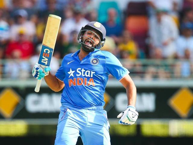 India's Rohit Sharma celebrates his century during the match. Sharma has notched up two tons in two consecutive matches. (AFP Photo) 