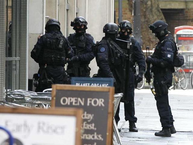Armed police enter a building near Tottenham Court Road in London after a terror alert. (AP Photo) Armed police enter a building near Tottenham Court Road in London after a terror alert. (AP Photo)