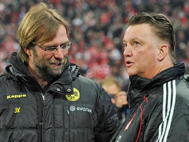 Liverpool manager Jurgen Klopp and his counterpart Louis van Gaal are grappling with similar problems ahead of their meeting at Anfield. (Reuters Photo) Liverpool manager Jurgen Klopp and his counterpart Louis van Gaal are grappling with similar problems ahead of their meeting at Anfield. (Reuters Photo)