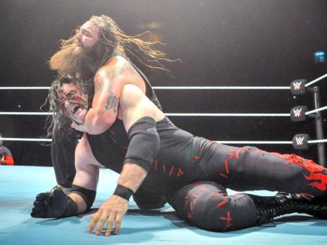 An intense encounter between Demon Kane and Bray Wyatt. (Photo: WWE.com) An intense encounter between Demon Kane and Bray Wyatt. (Photo: WWE.com)