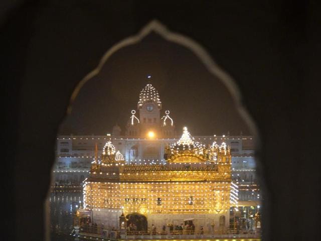 A view of the illuminated Golden Temple from the window of the darbar. (Sameer Sehgal/HT Photo)