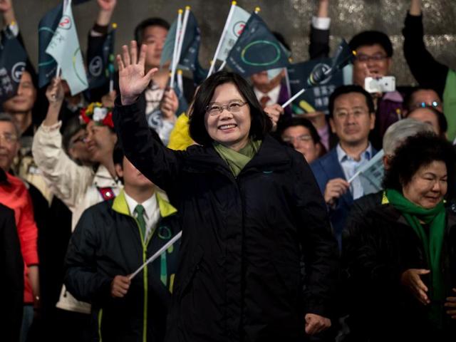 Democratic Progressive Party (DPP) presidential candidate Tsai Ing-wen (C) celebrates her victory inTaipei on January 15, 2016. Voters in Taiwan elected a Beijing-sceptic president in a dramatic democratic journey, carving their own political path against China's wishes. (AFP) Democratic Progressive Party (DPP) presidential candidate Tsai Ing-wen (C) celebrates her victory inTaipei on January 15, 2016. Voters in Taiwan elected a Beijing-sceptic president in a dramatic democratic journey, carving their own political path against China's wishes. (AFP)