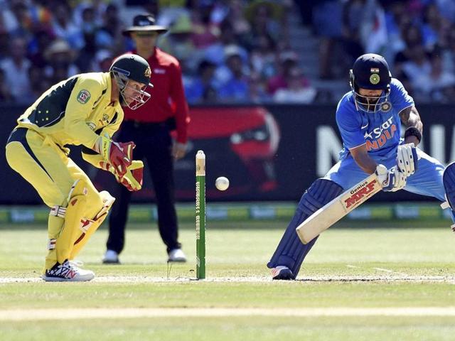 Virat Kohli plays a shot in front of Australia's Matthew Wade. (AP)