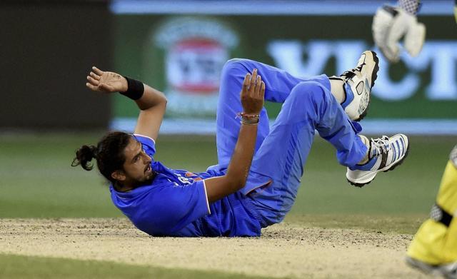 Ishant Sharma falls to the ground after bowling to Australia's James Faulkner. (AP) Ishant Sharma falls to the ground after bowling to Australia's James Faulkner. (AP)
