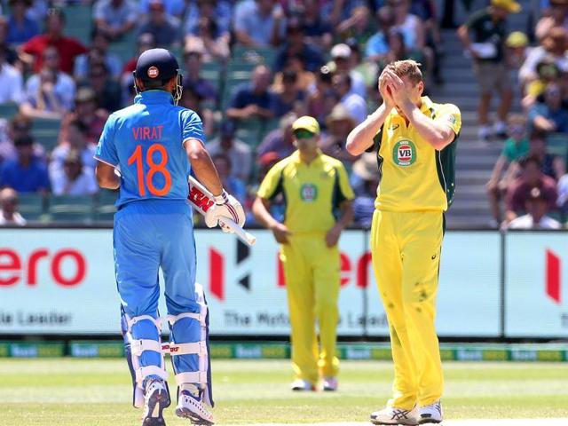 Australia's James Faulkner shows his frustration at a near miss against India's Virat Kohli during their One Day cricket match at the Melbourne Cricket Ground. (REUTERS)