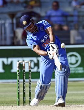 India's MS Dhoni hits a six against Australia. (AP) India's MS Dhoni hits a six against Australia. (AP)