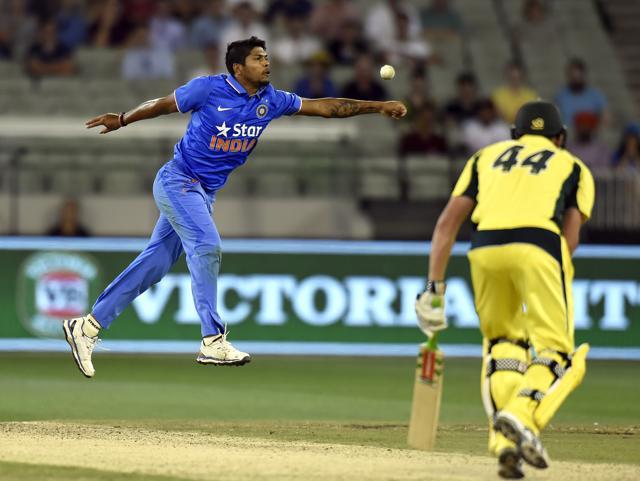 Umesh Yadav fields after bowling to Australia's James Faulkner. (AP) Umesh Yadav fields after bowling to Australia's James Faulkner. (AP)