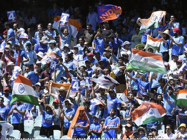 Indian fans cheer their team during their one day international cricket match against Australia in Melbourne. (AP)