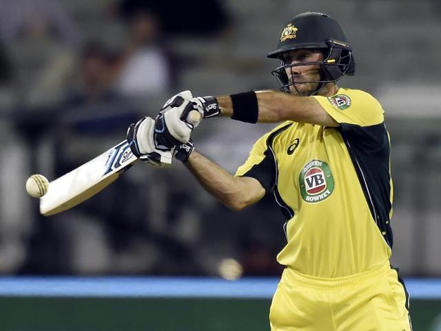 Australia's Steven Smith bats as India's Mahendra Singh Dhoni watches during their One Day cricket match. (Reuters Photo) Australia's Steven Smith bats as India's Mahendra Singh Dhoni watches during their One Day cricket match. (Reuters Photo)