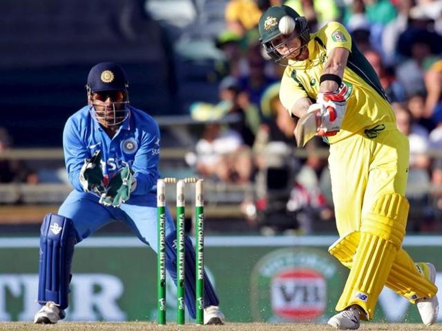Australia's Steve Smith (R) hits a six as India's wicketkeeper MS Dhoni looks on during the One Day International cricket match in Perth January 12, 2016. The 3rd ODI will be played at Melbourne on January 17, 2016. (REUTERS) Australia's Steve Smith (R) hits a six as India's wicketkeeper MS Dhoni looks on during the One Day International cricket match in Perth January 12, 2016. The 3rd ODI will be played at Melbourne on January 17, 2016. (REUTERS)