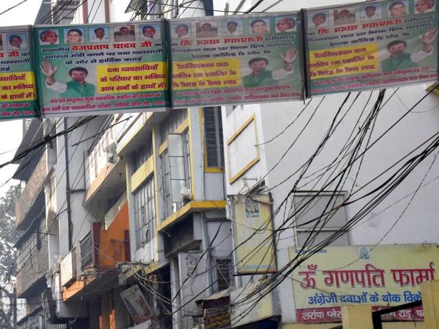 Banners with health minister Tej Pratap Yadav’s picture have come up near medicine shops in Patna. (AP Dube/HT Photo) Banners with health minister Tej Pratap Yadav’s picture have come up near medicine shops in Patna. (AP Dube/HT Photo)