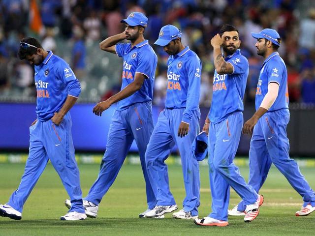 The Indian team leaves the field after their loss against Australia during their One Day cricket match at the Melbourne Cricket Ground. (REUTERS)