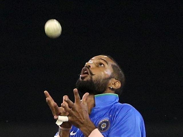 India's Shikhar Dhawan takes a catch to dismiss Australia's Matthew Wade during their One Day cricket match at the Melbourne Cricket Ground. (REUTERS)