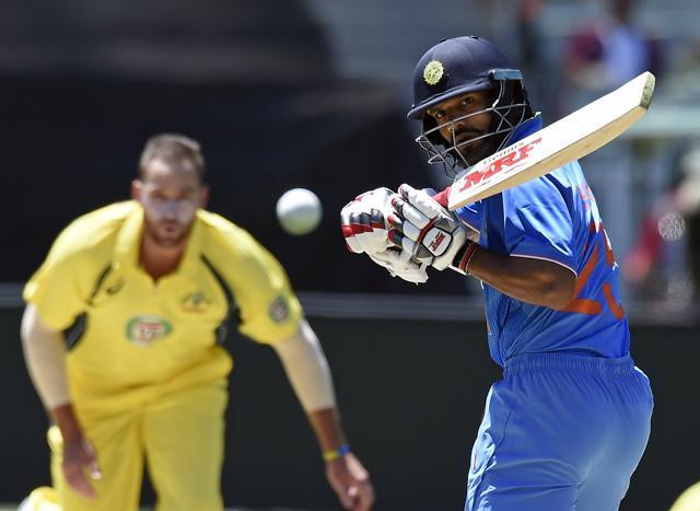 Shikhar Dhawan watches a ball bowled by Australia's John Hastings during their one day international cricket match in Melbourne. (AP) Shikhar Dhawan watches a ball bowled by Australia's John Hastings during their one day international cricket match in Melbourne. (AP)