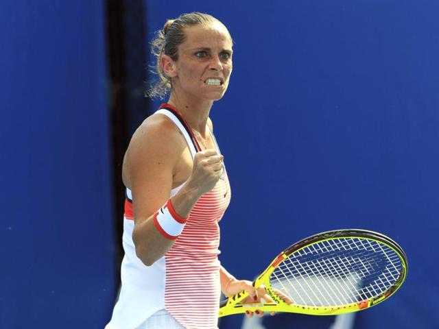 Italy's Roberta Vinci celebrates during her first round match against Austria's Tamira Paszek. (Reuters Photo)