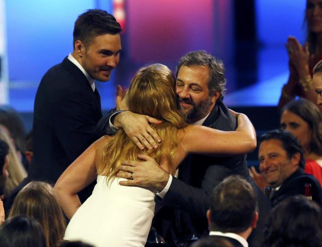 Amy Schumer is congratulated by Judd Apatow as she wins the award for Best Actress in a Comedy for Trainwreck. (REUTERS) Amy Schumer is congratulated by Judd Apatow as she wins the award for Best Actress in a Comedy for Trainwreck. (REUTERS)